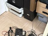 a keyboard, speakers, and other electronic equipment on the floor