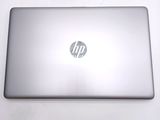 a laptop that is sitting on a white table