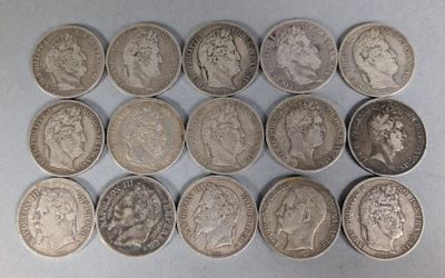 six different types of silver coins on a white surface