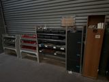 a garage with a lot of storage and a door