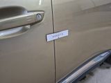 a sticker on the door handle of a car