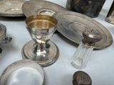 a lot of silver items on the table