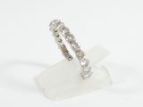 a ring that is sitting on top of a clear piece of plastic