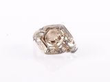 a close up of a ring with a stone in it