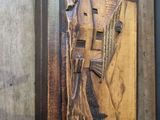 a picture of a wooden plaque with a bird on it