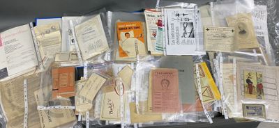 a suitcase filled with many different types of papers