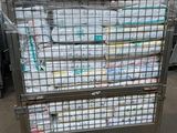 a large metal cart with a lot of diapers on it