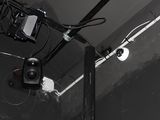 a camera that is attached to a pole in a room