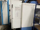 a machine that is sitting inside of a building