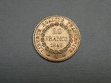 a gold coin with the inscription 20 frans on it
