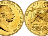 a close up of a gold coin with a man on it