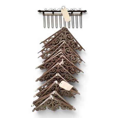 an image of a bunch of wooden birdhouses hanging on a wall