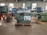 a machine that is sitting in the middle of a factory