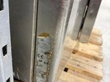 a close up of a piece of metal on a pallet