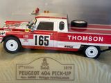 a red and white truck in a display case