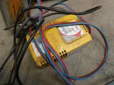 a yellow box that has some wires in it