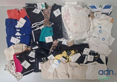 a lot of clothes that are on a table
