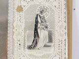 a picture of a woman in a white dress on a doily