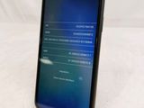 the back of a black samsung s9 with a display on the screen