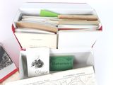 a box full of books on a table next to a book