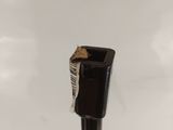 a toothbrush with a tooth brush sticking out of it ' s end