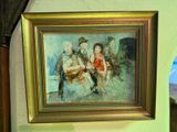 a picture of a painting hanging on a wall next to a lamp