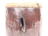a wooden stool with a hole in it