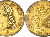 a gold sovereign coin with a crown on top of it