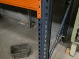 a picture of a metal rack in a warehouse