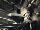 a close up view of a car ' s front suspension
