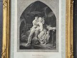 a framed picture of a man and woman sitting on a bed