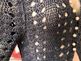 a mannequin wearing a crocheted jacket on a mannequin mannequin mannequin mannequin mannequin mannequin