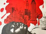a poster of a man laying on a bed in front of a cityscape