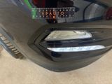 a close up of a black car with a sticker on it