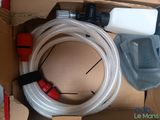 a box with a bunch of hoses inside of it