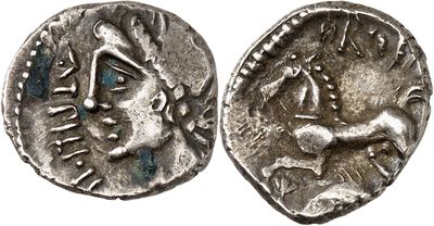 a silver coin with an image of a man on it