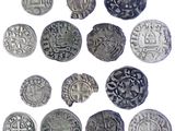 une image représentant un ensemble de pièces d'argent ornées de motifs variés