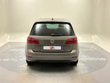 a car that is parked in a room with a white floor