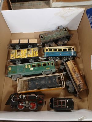 a box full of toy trains and cars in it