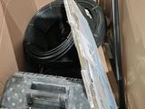 a cardboard box with a bunch of wires in it