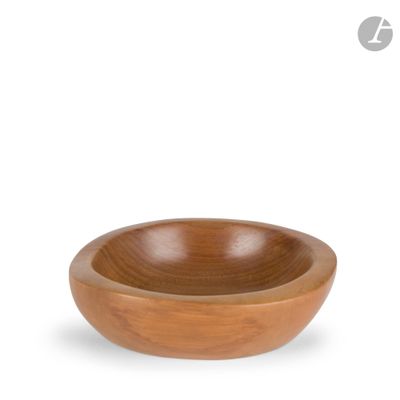 wooden bowl on a white background with a small wooden bowl in the middle of the bowl