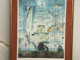 tableau encadré représentant une femme sur un bateau en pleine mer