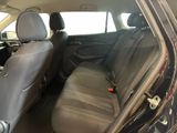 the back seats of a car are empty in the car