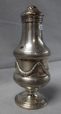 an antique silver vase with a snake on it on a table