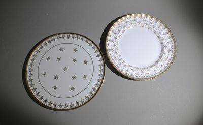 two plates that are sitting next to each other on a table