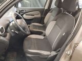 the interior of a car with two seats and a steering wheel