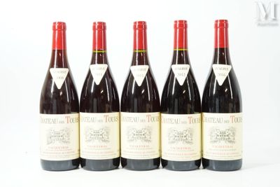 six bottles of red wine are lined up in a row