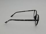 a close up of a pair of glasses on a white surface