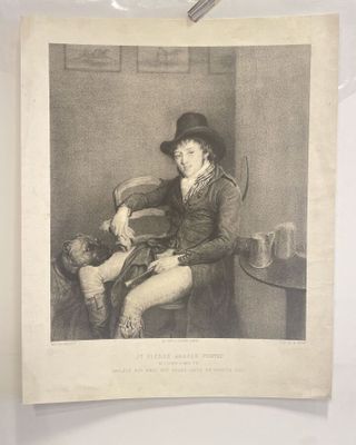 a black and white photo of a man sitting in a chair