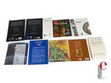 a lot of books that are sitting on a table